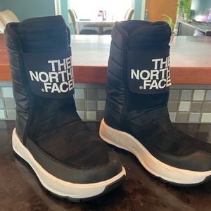 North face black water proof slip on snow boots